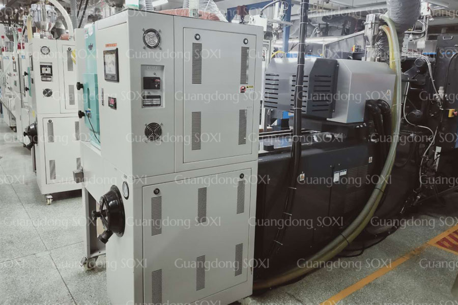 Plastics Machinery In Central Loading System